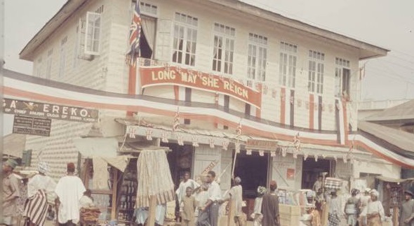 "Ereko Market, Lagos decorated for Queen Elizabeth II's visit to Nigeria in 1956 photo by Carl Mydans