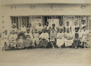 Kofoworola Aina Moore in a group picture with native women