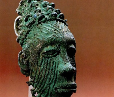 Leaded Bronze pendant discovered in Igbo-Ukwu, c.900-1000 AD. Facial scarification is that of titled men of Nri.