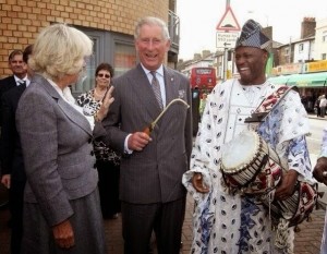 Appreciating the Talking Drum here is Prince Charles of Englad 