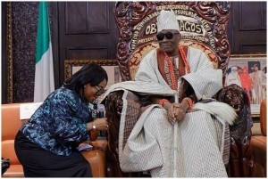 Oba Akiolu attending to a caller