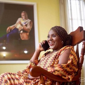 Joke Silva with a portrait of husband in background